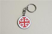 Porte-clé 5 croix sur fond rond