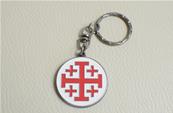 Porte-clé 5 croix sur fond rond